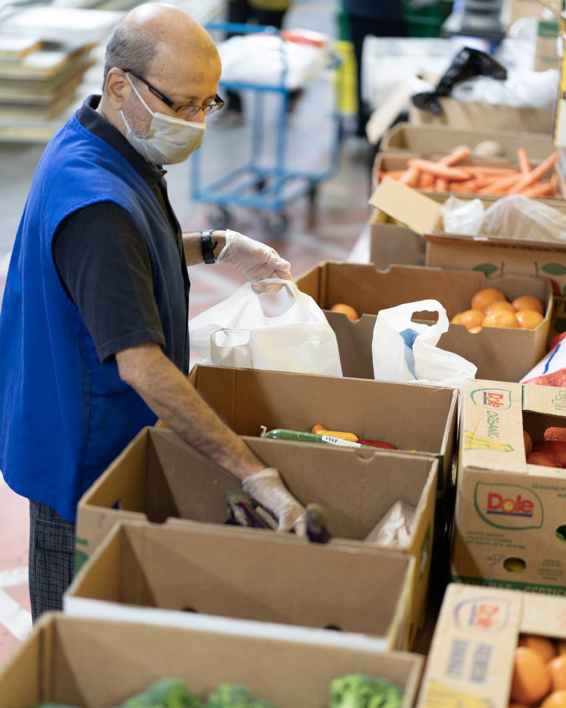 RFB Volunteer sorting food into boxes